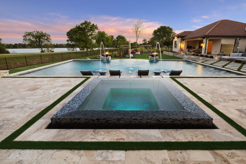 Custom pool with perimeter-overflow spa and fountains, League City TX